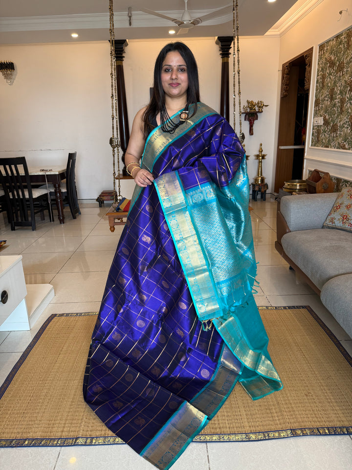 Dark Blue with Light Blue  , Zari Kattam in the body with mayil and Chakram butta , traditional borders and rich Pallu , silk cotton saree