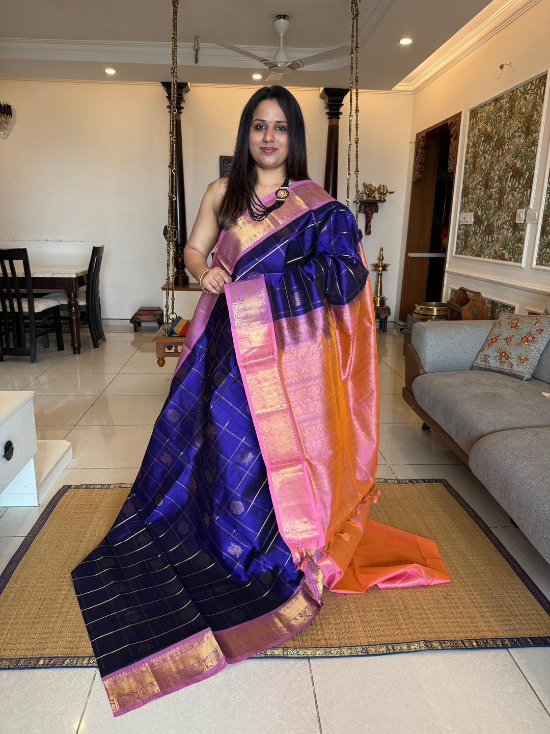 Blue with Baby Pink  , zari kattam in the body with Mayil and Chakram butta ,traditional borders and rich Pallu Silk Cotton Saree