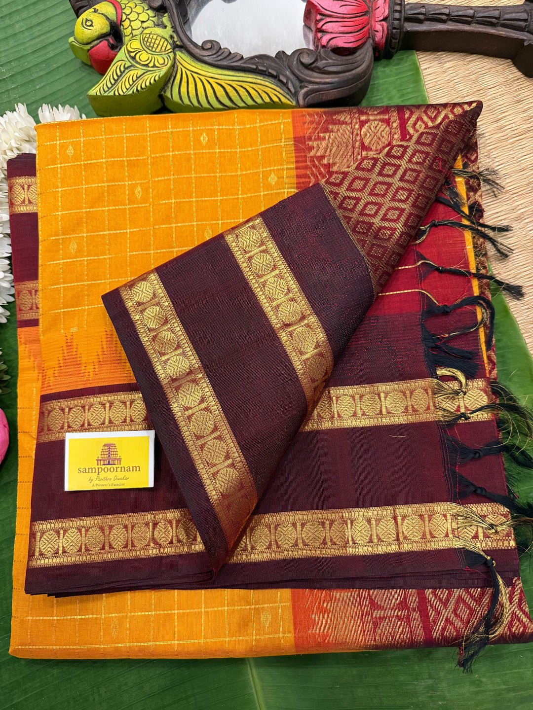 Manjal with Dark Maroon , traditional rettapet border , Zari kattam in the body with Zari butta , rich Pallu  Korvai Silk Cotton Saree
