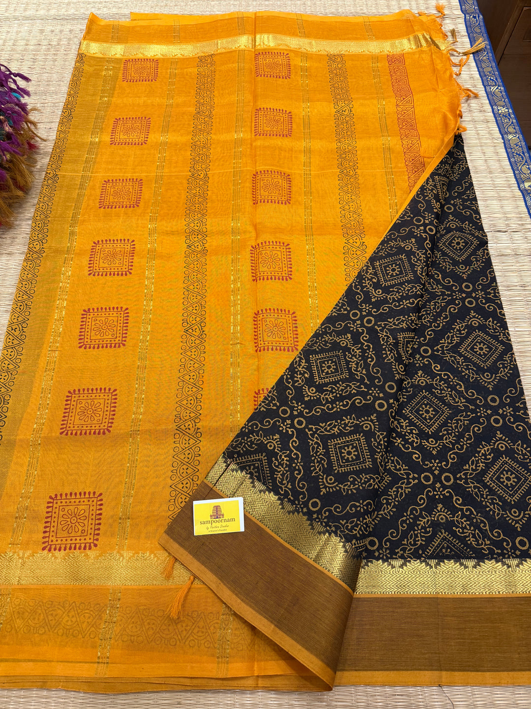 Black with Mustard Rangoli Deisgns all over the body, Silk Cotton Saree