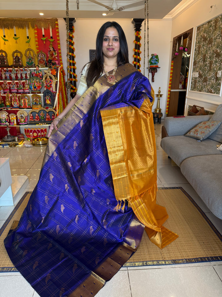 Blue with Mustard  Paithani  borders , parrot motifs in the body ,rich Pallu Korvai Silk Cotton Saree