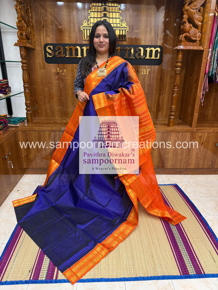 Blue with Orange , Zari Kattam in the body , rettapet border and rich  Pallu Korvai Silk Cotton Saree