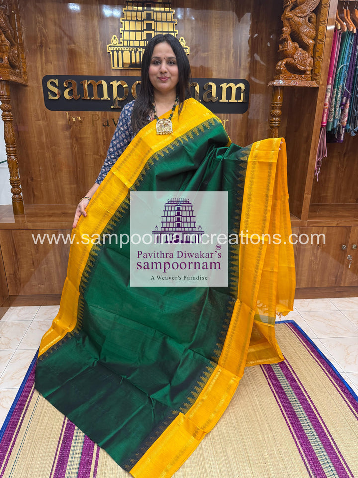 Dark Green with Manjal , temple rettapet border , grand Pallu Korvai Silk Cotton Saree