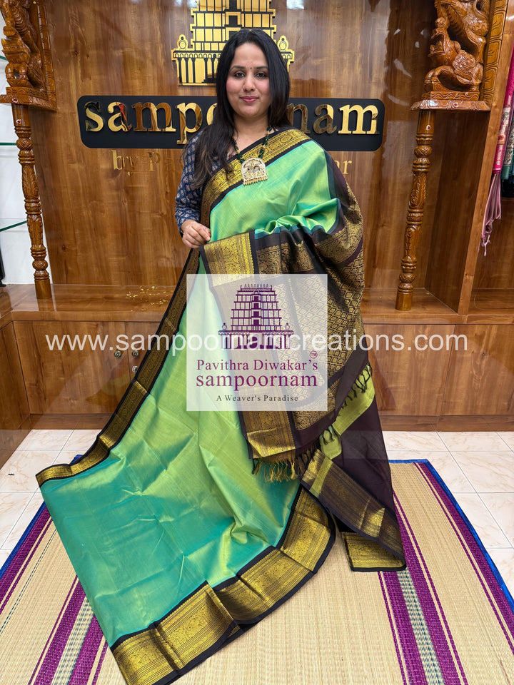 Pastel Green with Black , rich Kanchi one side big border with grand  Pallu Korvai Silk Cotton Saree
