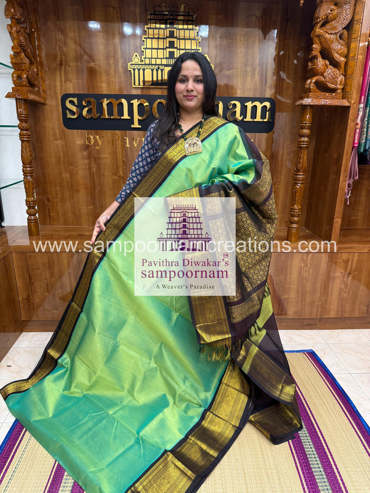 Pastel Green with Black , rich Kanchi one side big border with grand  Pallu Korvai Silk Cotton Saree