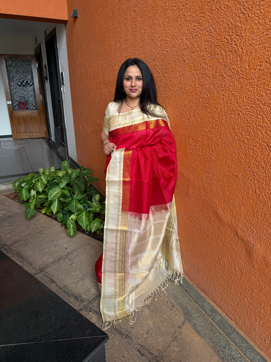Red with Offwhite , rich zari checks in the body , rettapet plain border and grand pallu , Korvai Silk Cotton Saree