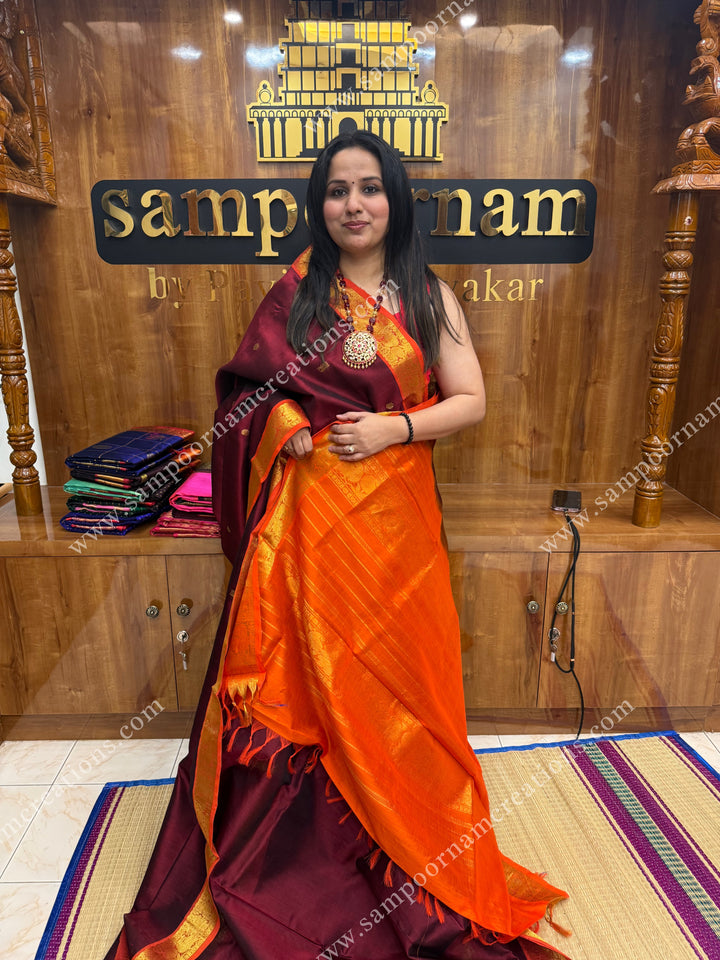 Araku with Orange , Zari butta in the body , traditional borders and grand Pallu , Ten Yards Silk Cotton Saree