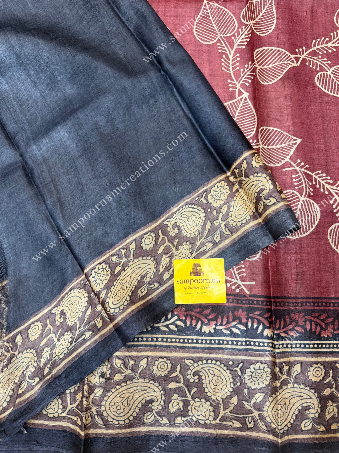 Maroon with Cream saree with Hand Painted leaf designs in the body and Paisley Prints in the border and Pallu ,  Pure Tussar Silk Saree