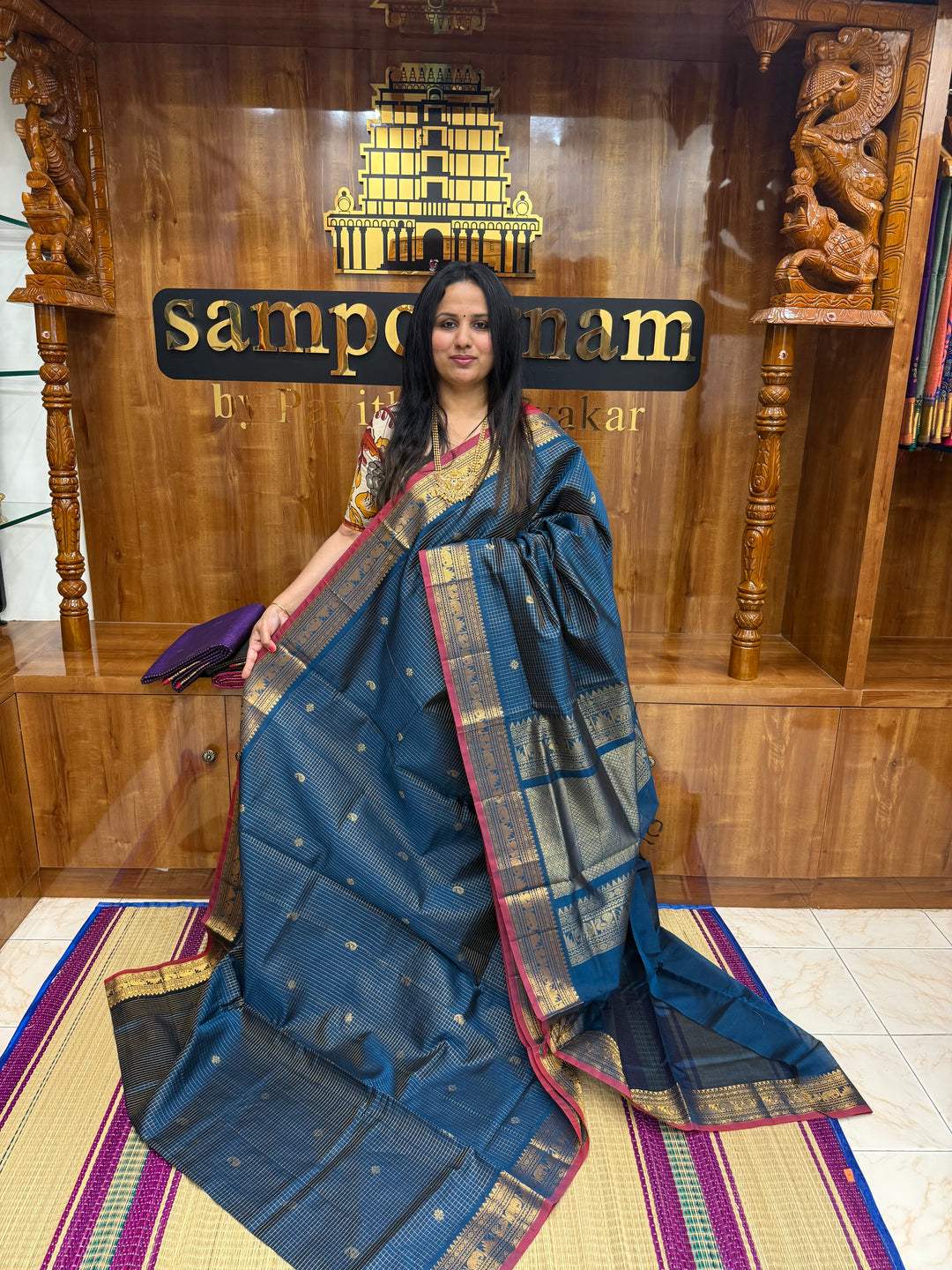 Teel Blue , Zari Podi Kattam with Butta in the body and rich pallu, semi silk cotton sarees