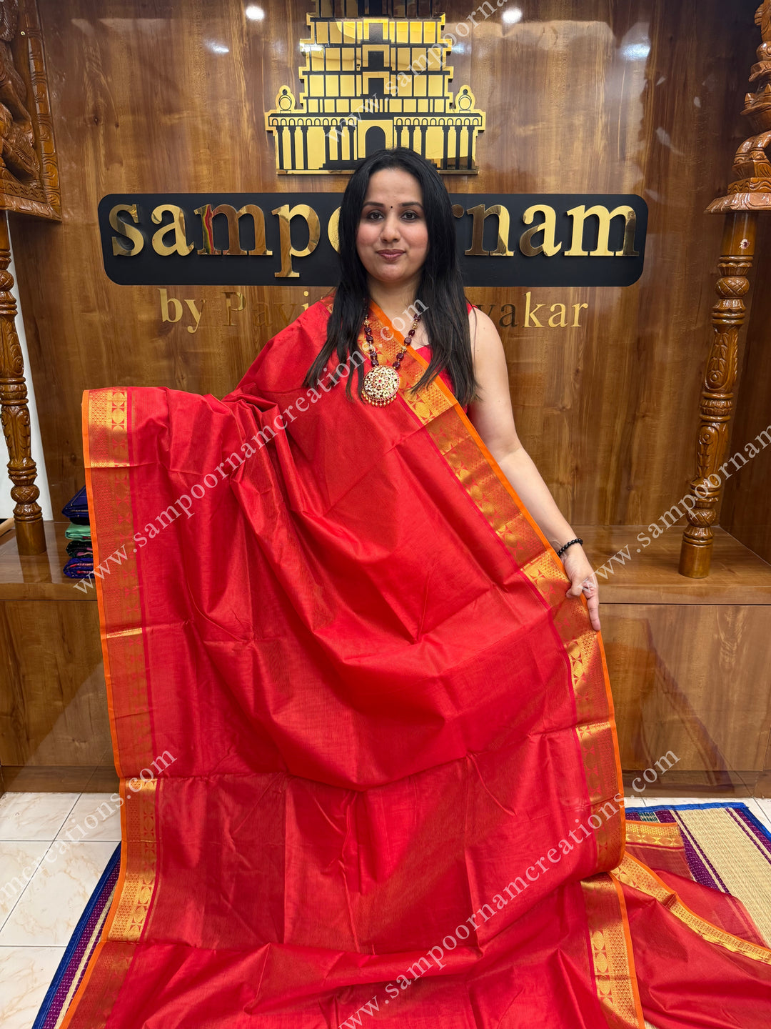 Red , Orange Selvedge , Vairaoosi Zari Lines in the body , traditional borders and rich Pallu ,Ten Yards Silk Cotton Saree