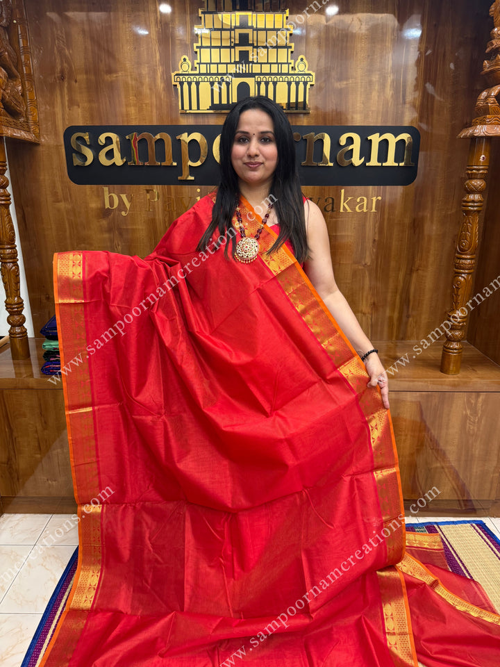 Red , Orange Selvedge , Vairaoosi Zari Lines in the body , traditional borders and rich Pallu ,Ten Yards Silk Cotton Saree