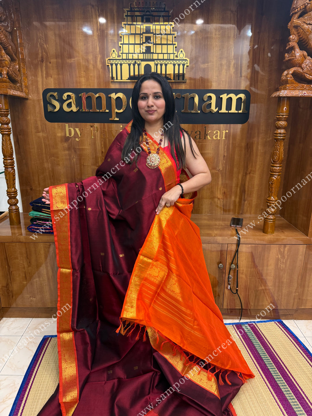 Araku with Orange , Zari butta in the body , traditional borders and grand Pallu , Ten Yards Silk Cotton Saree