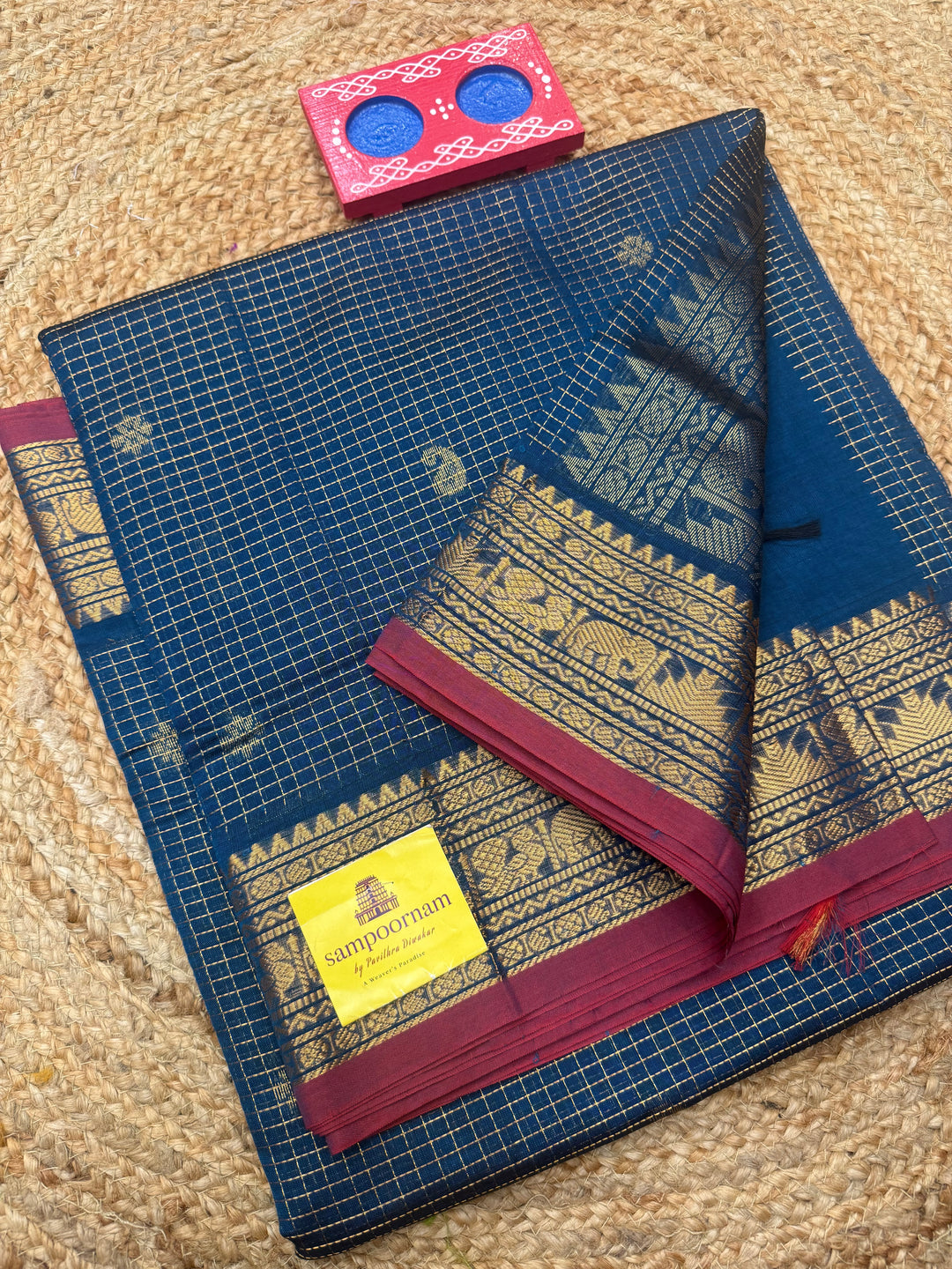 Teel Blue , Zari Podi Kattam with Butta in the body and rich pallu, semi silk cotton sarees