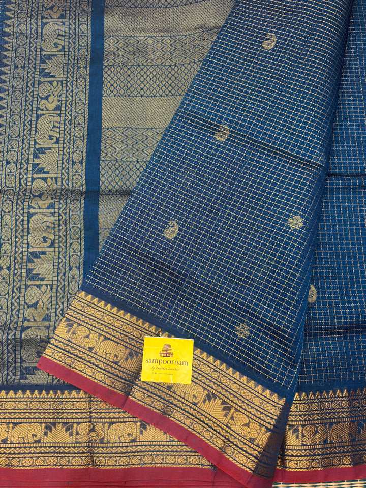 Teel Blue , Zari Podi Kattam with Butta in the body and rich pallu, semi silk cotton sarees
