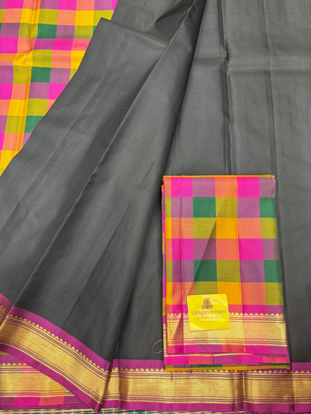 A Classic Black with Small Border with  Traditional Pallum Pazham Kattam in the Pallu and Blouse