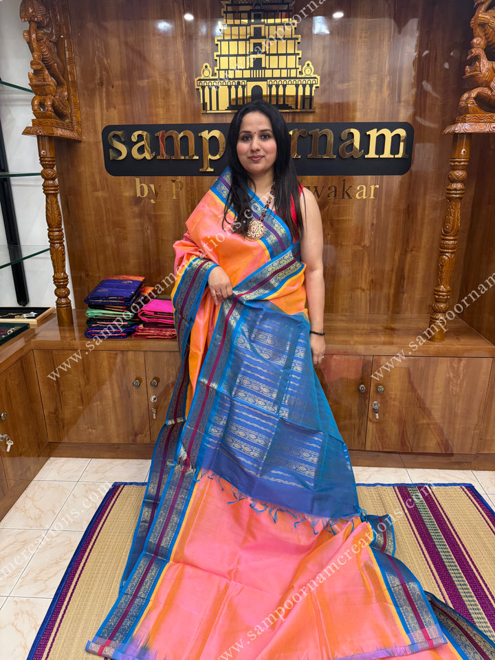 Peachish Pink with Copper Sulphate Blue , rettapet borders and rich pallu ,Ten Yards Korvai Silk Cotton Saree