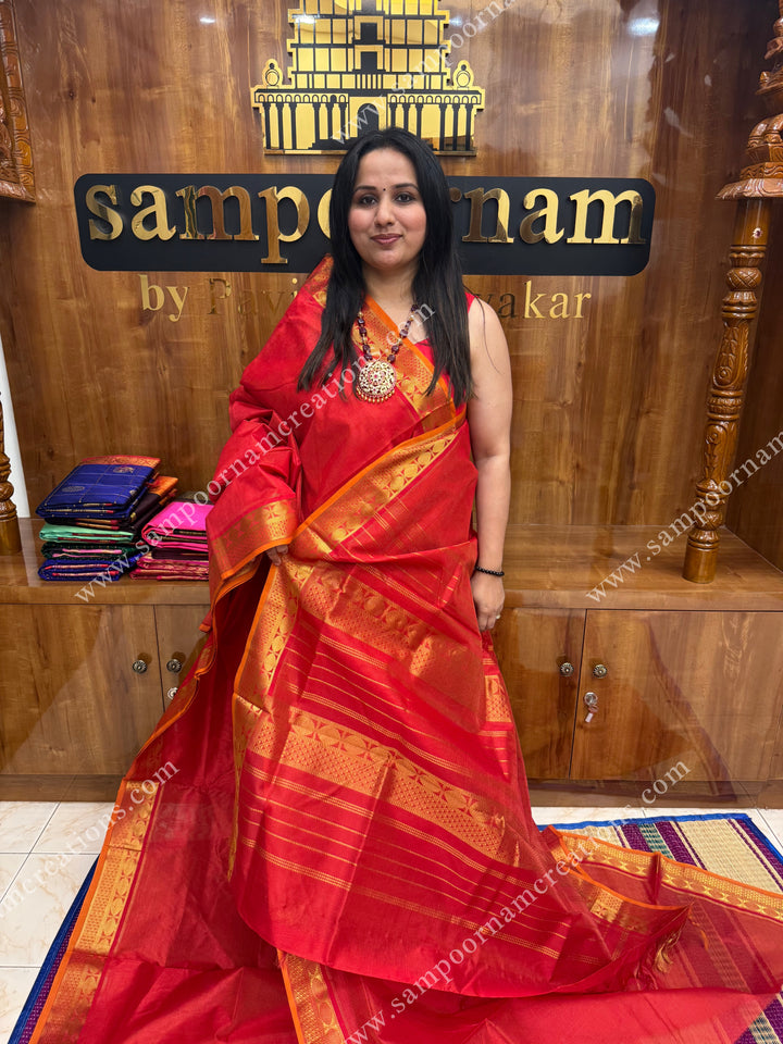 Red , Orange Selvedge , Vairaoosi Zari Lines in the body , traditional borders and rich Pallu ,Ten Yards Silk Cotton Saree