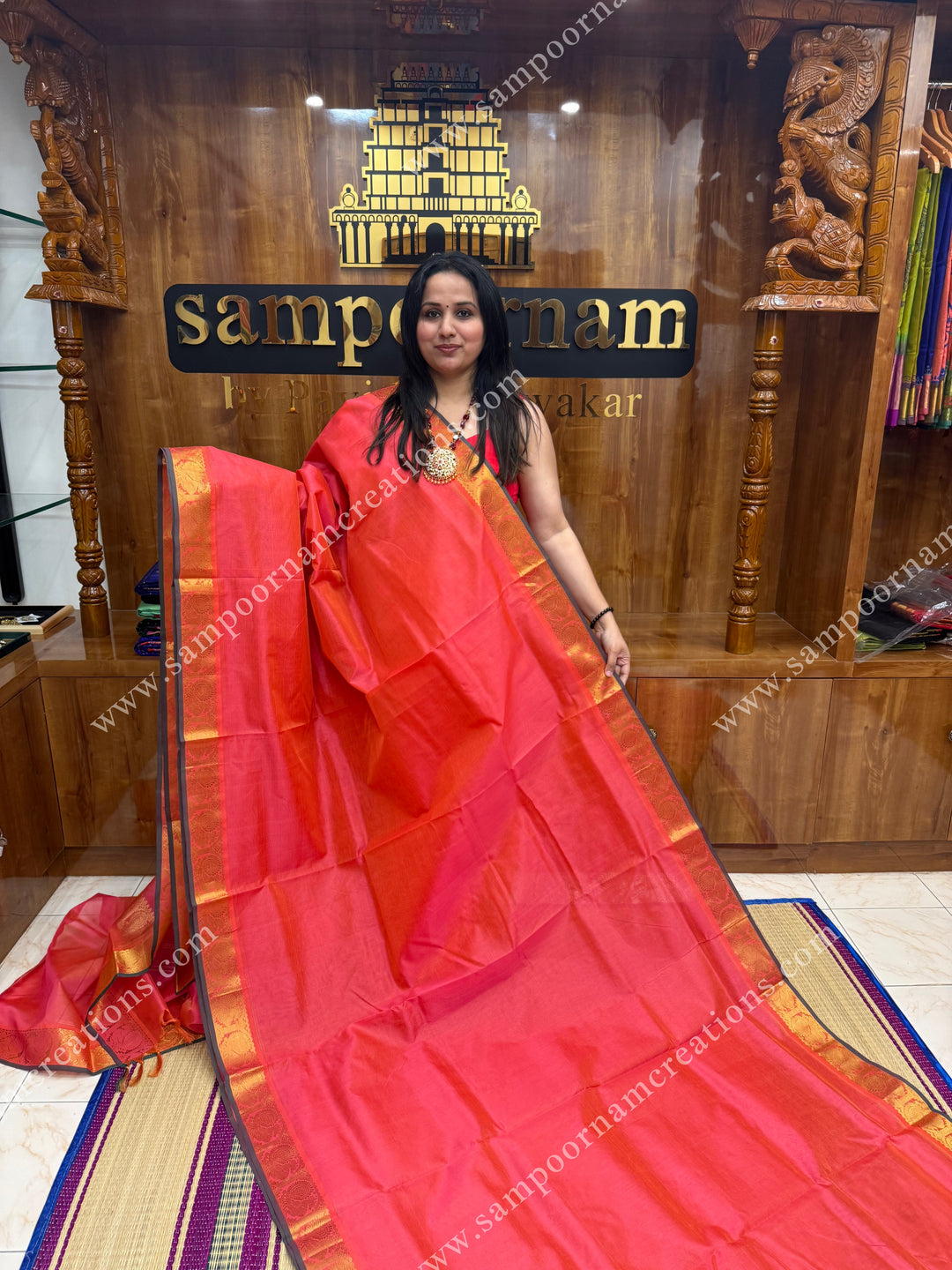 Peachish Pink , Green Selvedge , Vairaoosi Zari Lines in the body , traditional borders and rich Pallu ,Ten Yards Silk Cotton Saree