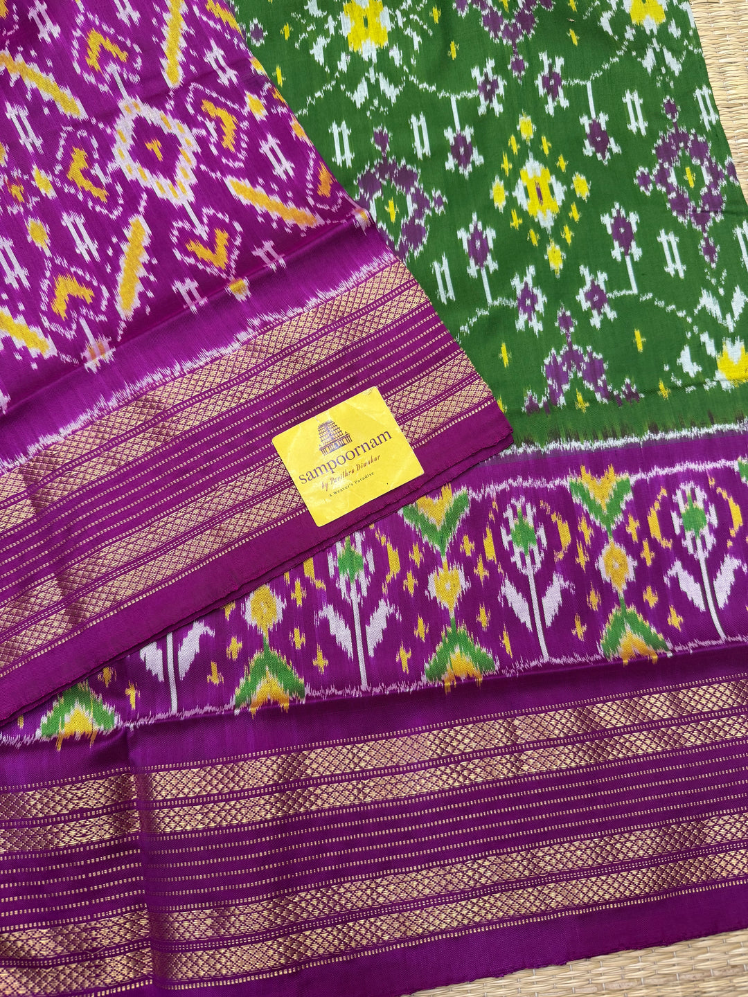 A stunning Green with Magenta saree , Pochampally design in the body and Pallu , Pure Pochampally Silk Saree