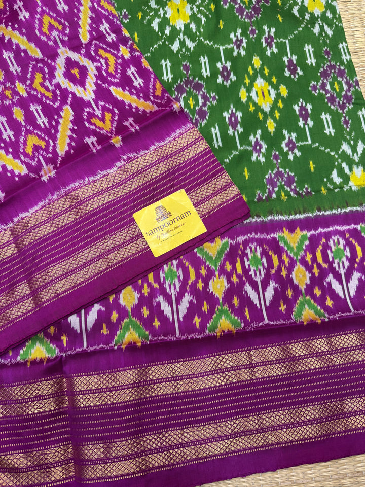 A stunning Green with Magenta saree , Pochampally design in the body and Pallu , Pure Pochampally Silk Saree