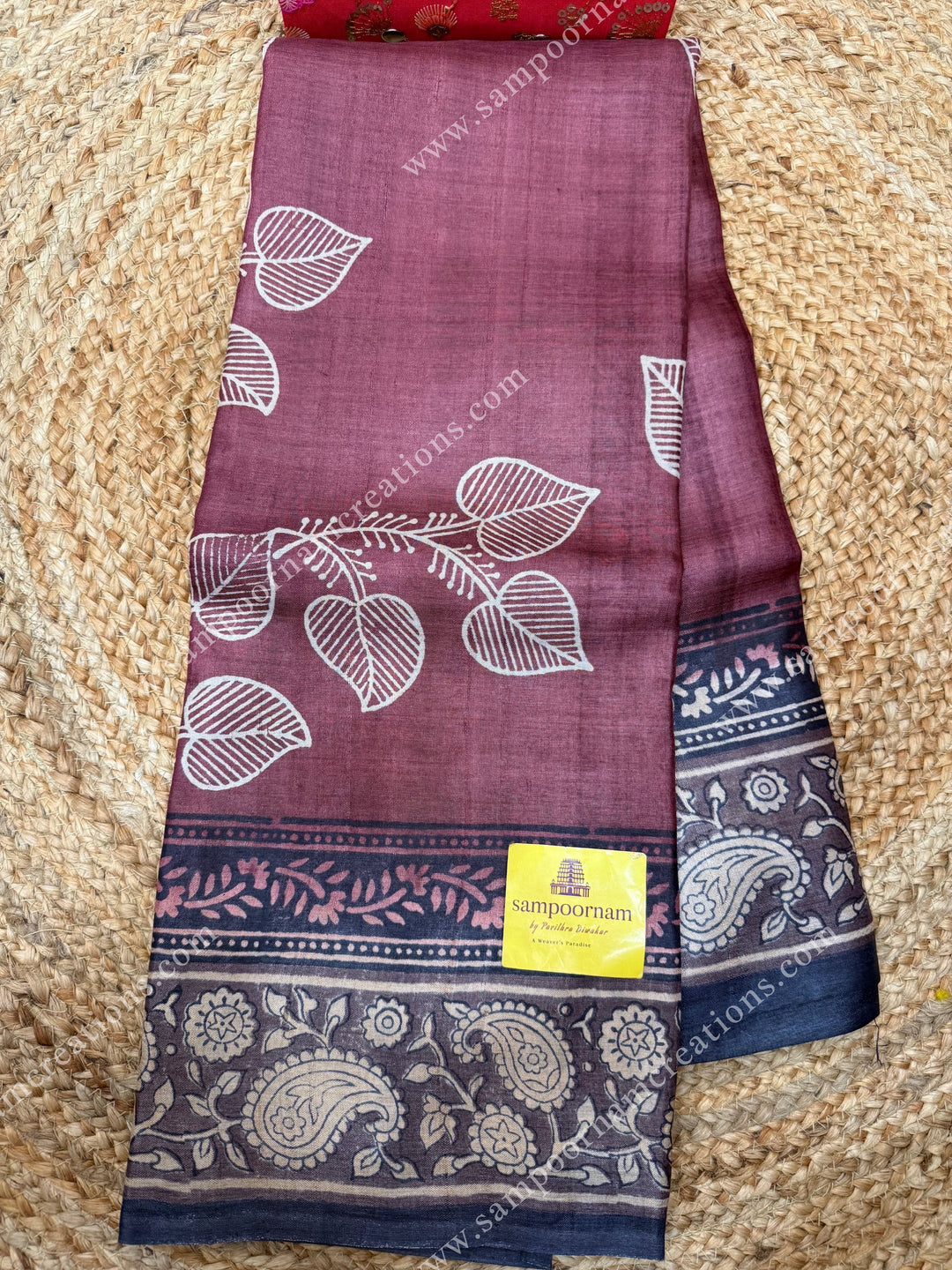 Maroon with Cream saree with Hand Painted leaf designs in the body and Paisley Prints in the border and Pallu ,  Pure Tussar Silk Saree