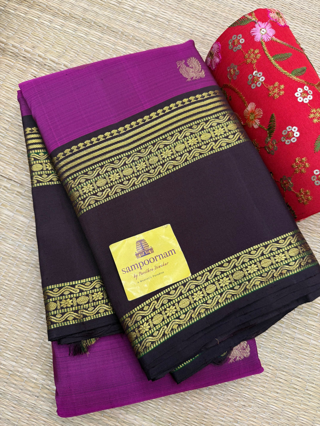 A Vintage Classic Jamun Colour Saree with Dark Brown, Traditional Mayil and Chakram Butta in the Body and Rich Zari Pallu , Pure Kanjivaram Silk Saree