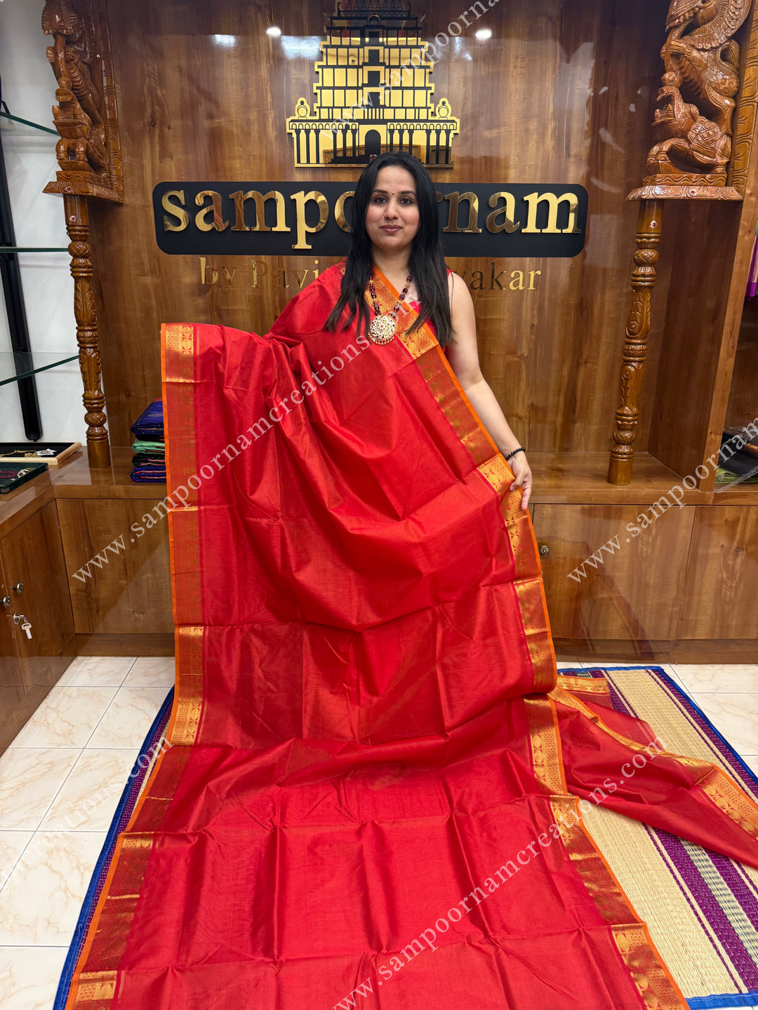 Red , Orange Selvedge , Vairaoosi Zari Lines in the body , traditional borders and rich Pallu ,Ten Yards Silk Cotton Saree