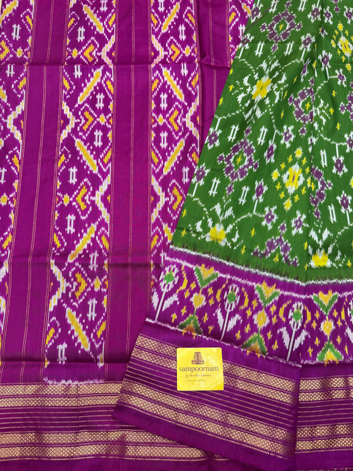 A stunning Green with Magenta saree , Pochampally design in the body and Pallu , Pure Pochampally Silk Saree