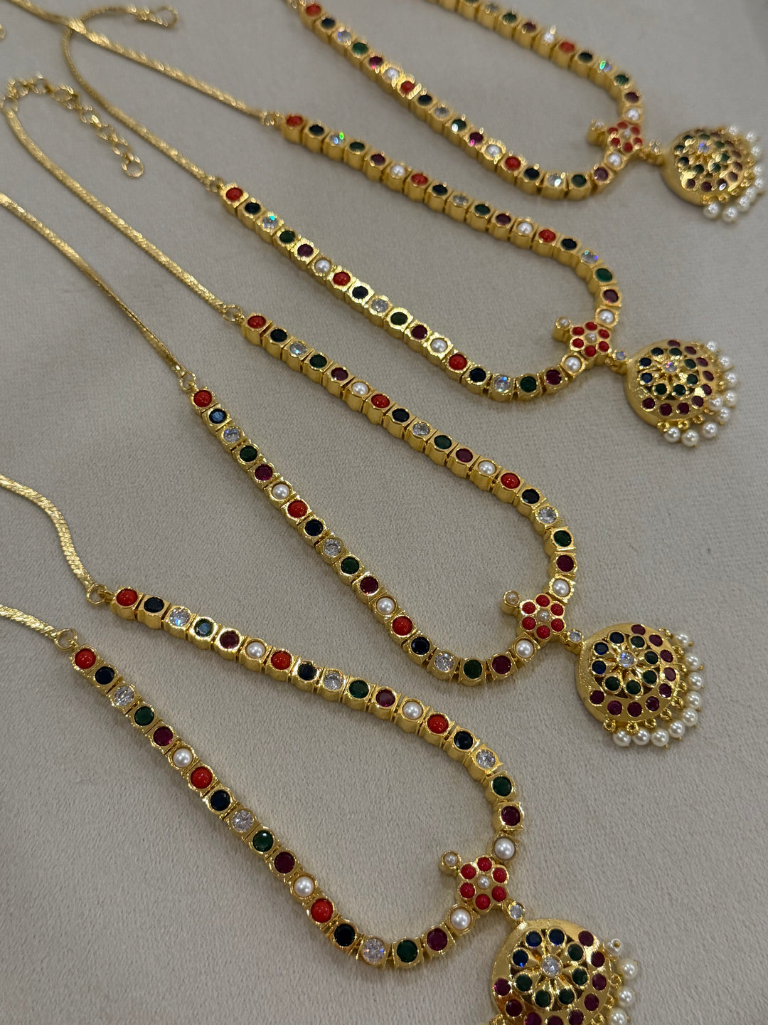An Heirloom Inspired Navaratna Addigai Set with Drop Earrings