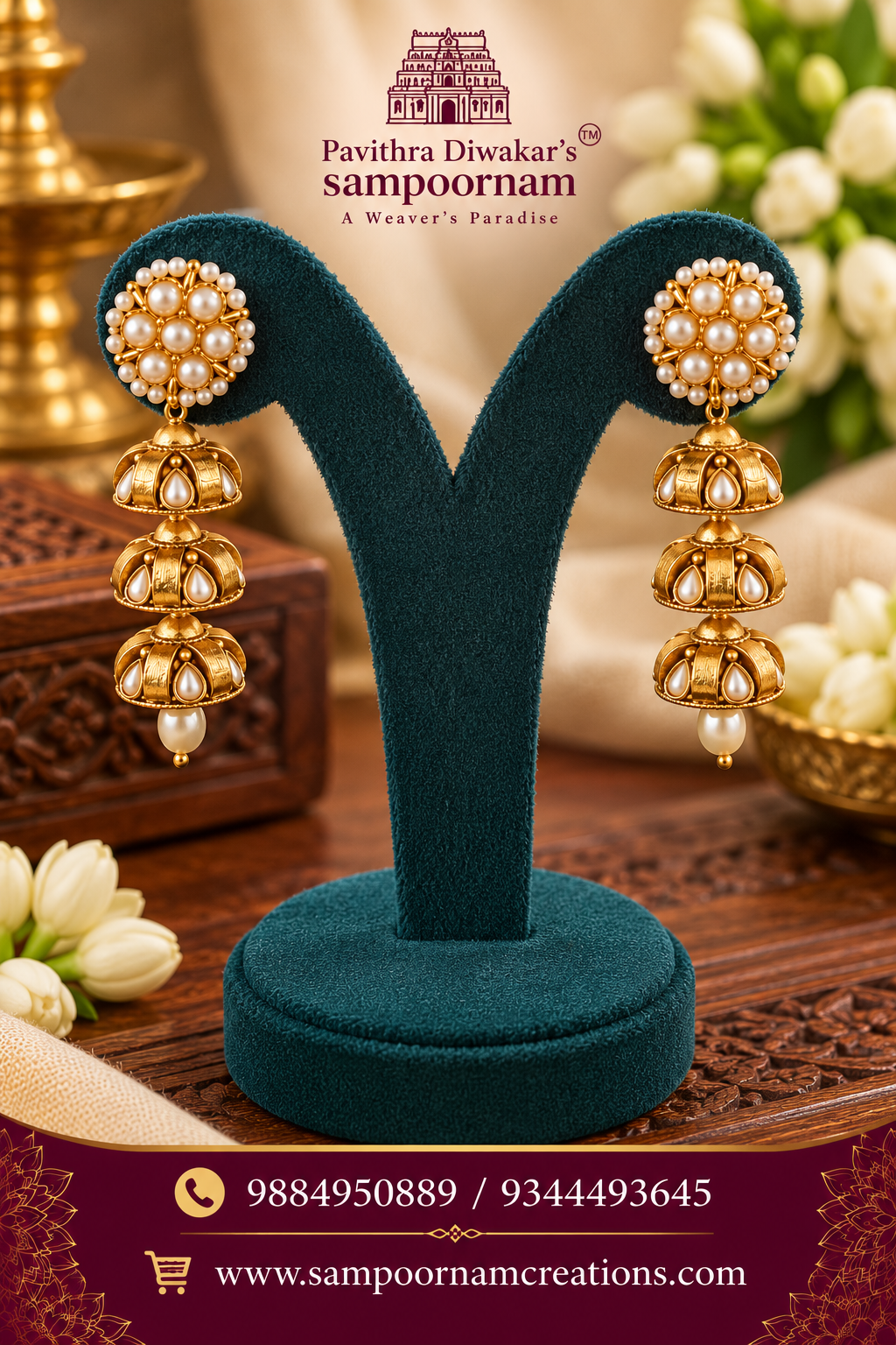 Elegant pearl-studded gold jhumkas featuring intricate detailing and graceful multi-tiered drops.