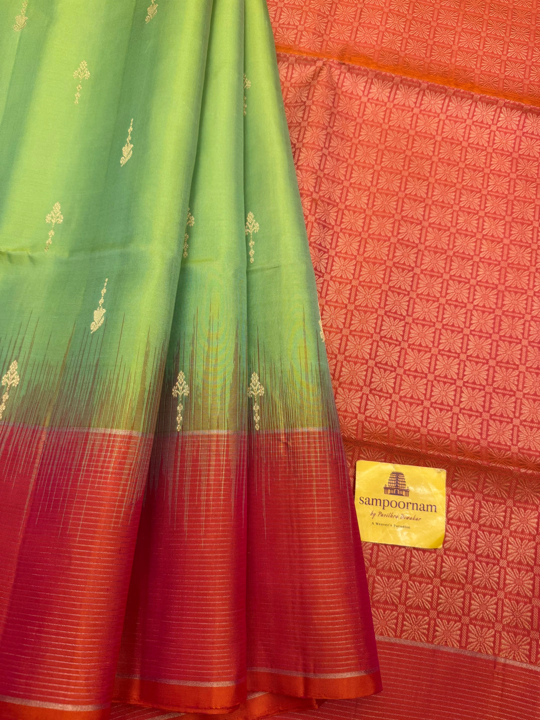 Double Shaded Green with Orangish Pink , Rich Zari Butta in the body and grand Pallu , Pure Soft Silk Saree