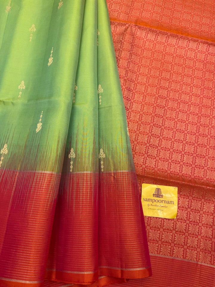 Double Shaded Green with Orangish Pink , Rich Zari Butta in the body and grand Pallu , Pure Soft Silk Saree