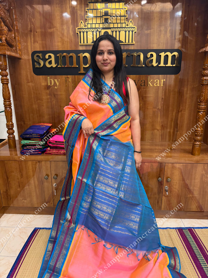 Peachish Pink with Copper Sulphate Blue , rettapet borders and rich pallu ,Ten Yards Korvai Silk Cotton Saree