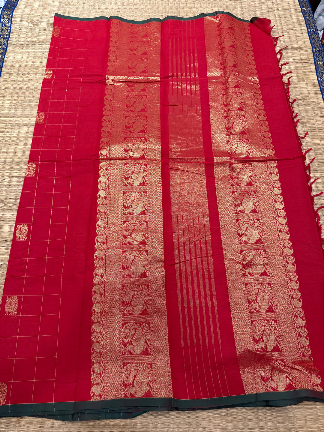 A beautiful red with green Selvedge, Zari Mayil butta and grand Kanchi pallu , Chettinad cotton saree