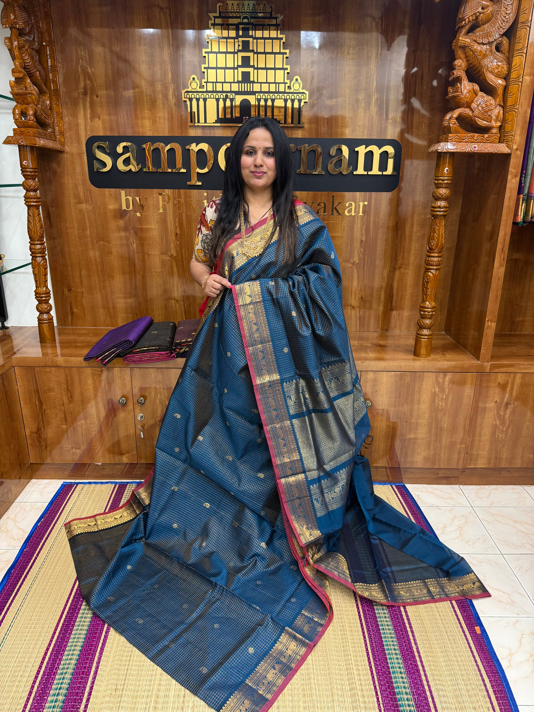 Teel Blue , Zari Podi Kattam with Butta in the body and rich pallu, semi silk cotton sarees
