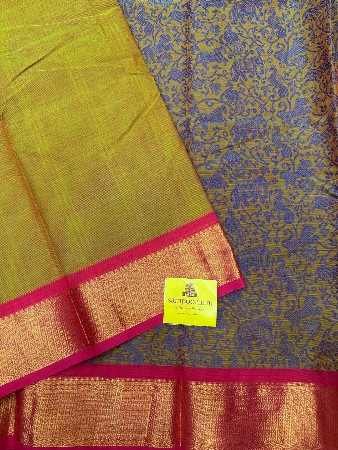 Manthulir Green with Pink ,  Rich Blue  Vanasingaram thread motif in the body , Traditional borders and Plain Pallu Chettinad Cottton Saree