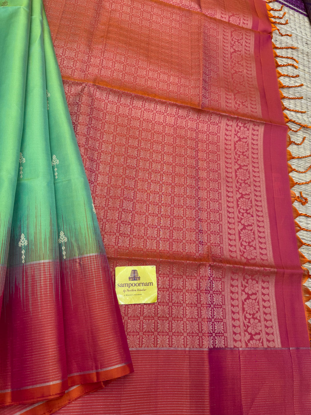 Double Shaded Green with Orangish Pink , Rich Zari Butta in the body and grand Pallu , Pure Soft Silk Saree