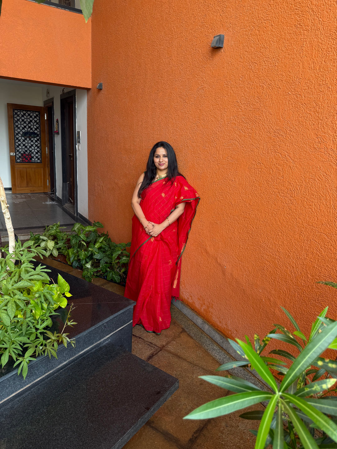 A beautiful red with green Selvedge, Zari Mayil butta and grand Kanchi pallu , Chettinad cotton saree