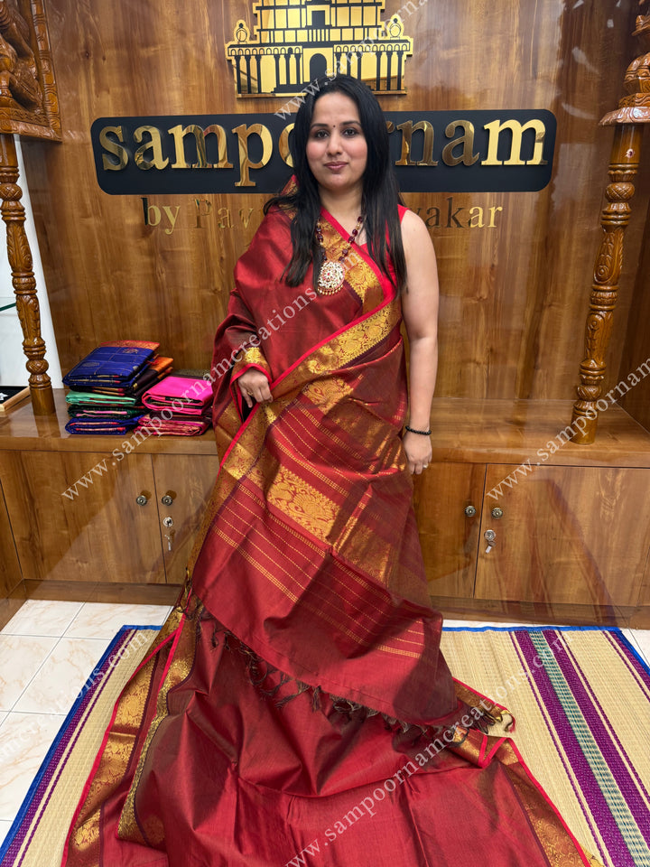 Maroon , Red Selvedge , Vairaoosi Zari Lines in the body , traditional borders and rich Pallu ,Ten Yards Silk Cotton Saree