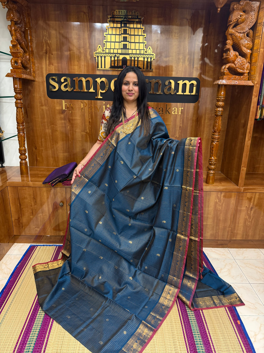 Teel Blue , Zari Podi Kattam with Butta in the body and rich pallu, semi silk cotton sarees