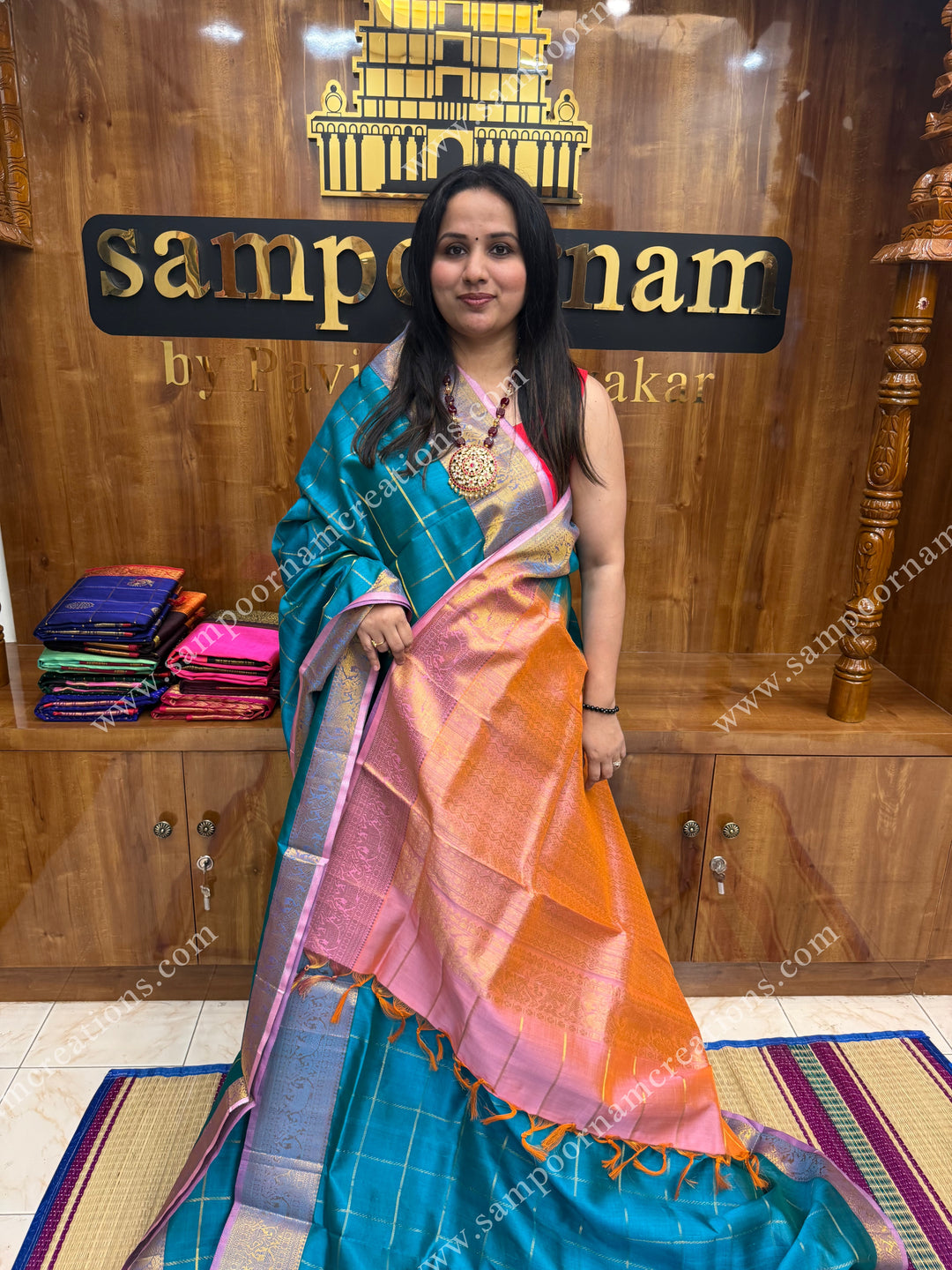 Turquoise Blue with Pink , Zari checks in the body , traditional borders and grand Pallu , Ten Yards Silk Cotton Saree