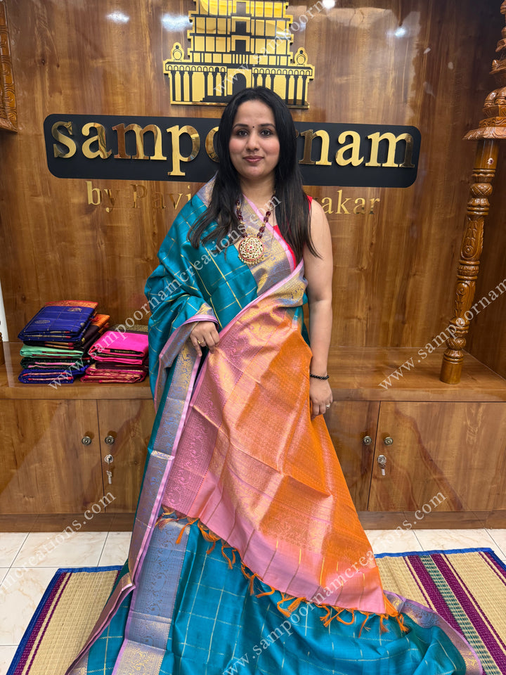 Turquoise Blue with Pink , Zari checks in the body , traditional borders and grand Pallu , Ten Yards Silk Cotton Saree
