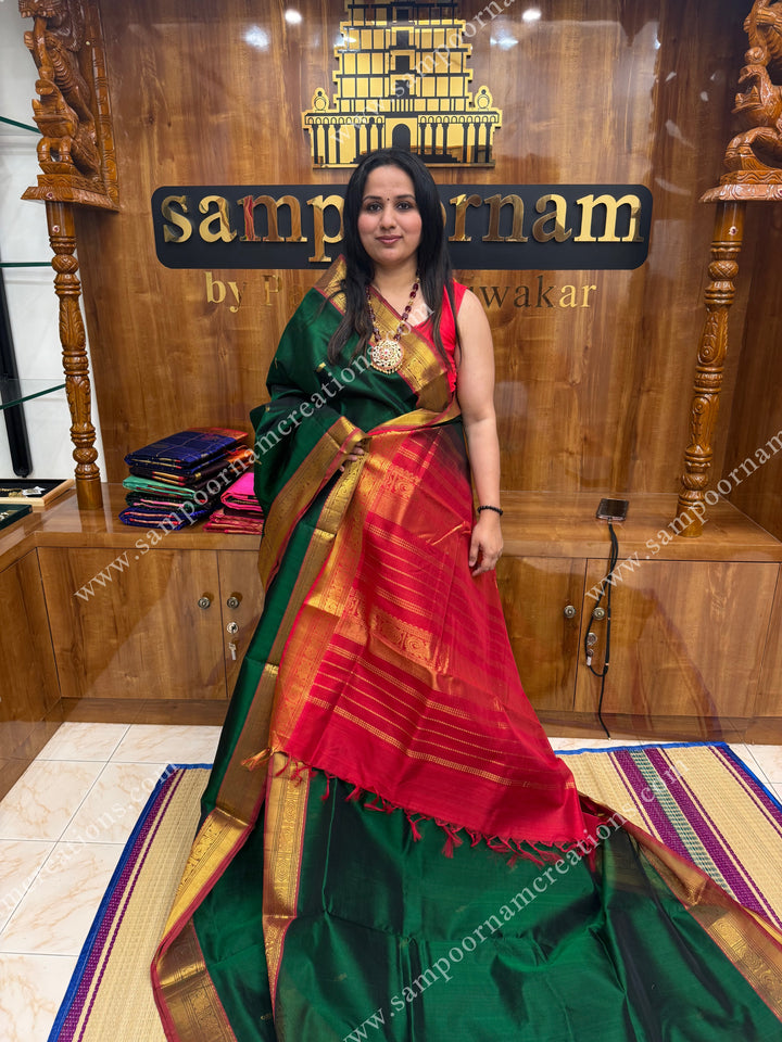 Green with Red , rich Mango Zari butta in the body , traditional borders and grand Pallu , Ten Yards Silk Cotton Saree