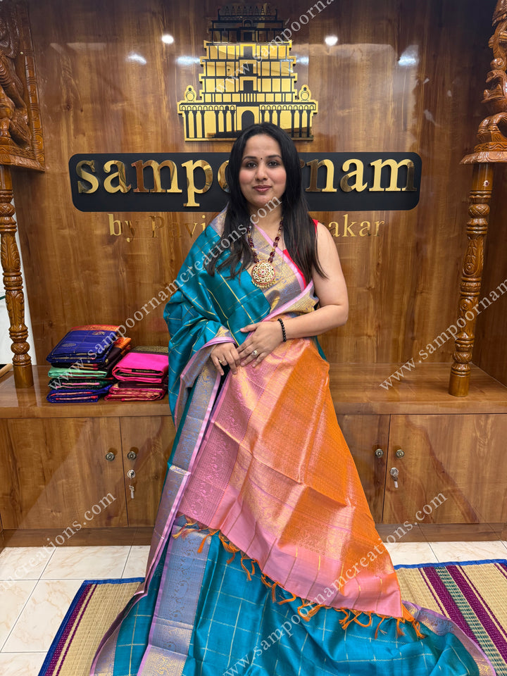 Turquoise Blue with Pink , Zari checks in the body , traditional borders and grand Pallu , Ten Yards Silk Cotton Saree