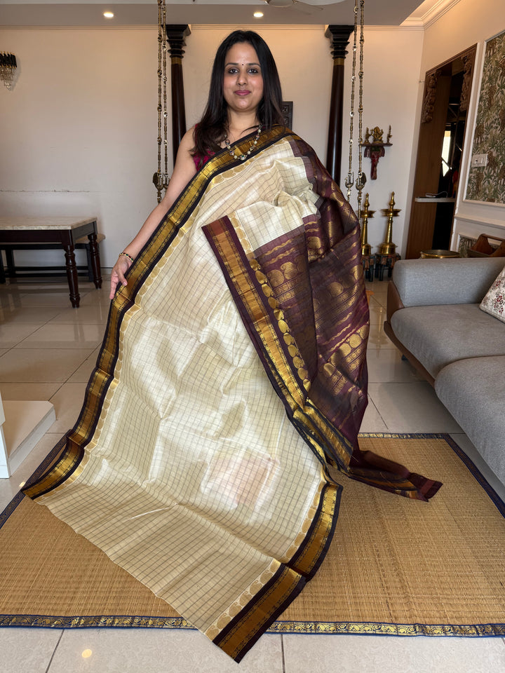Offwhite with Brown ,full body checks ,traditional border rich pallu Korvai Silk Cotton Saree