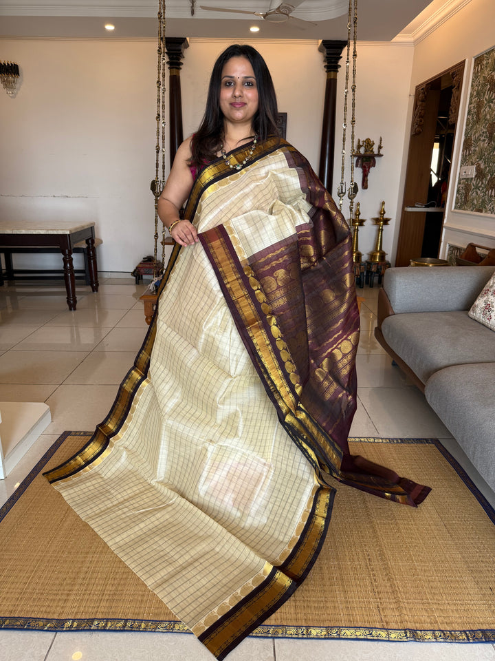 Offwhite with Brown ,full body checks ,traditional border rich pallu Korvai Silk Cotton Saree