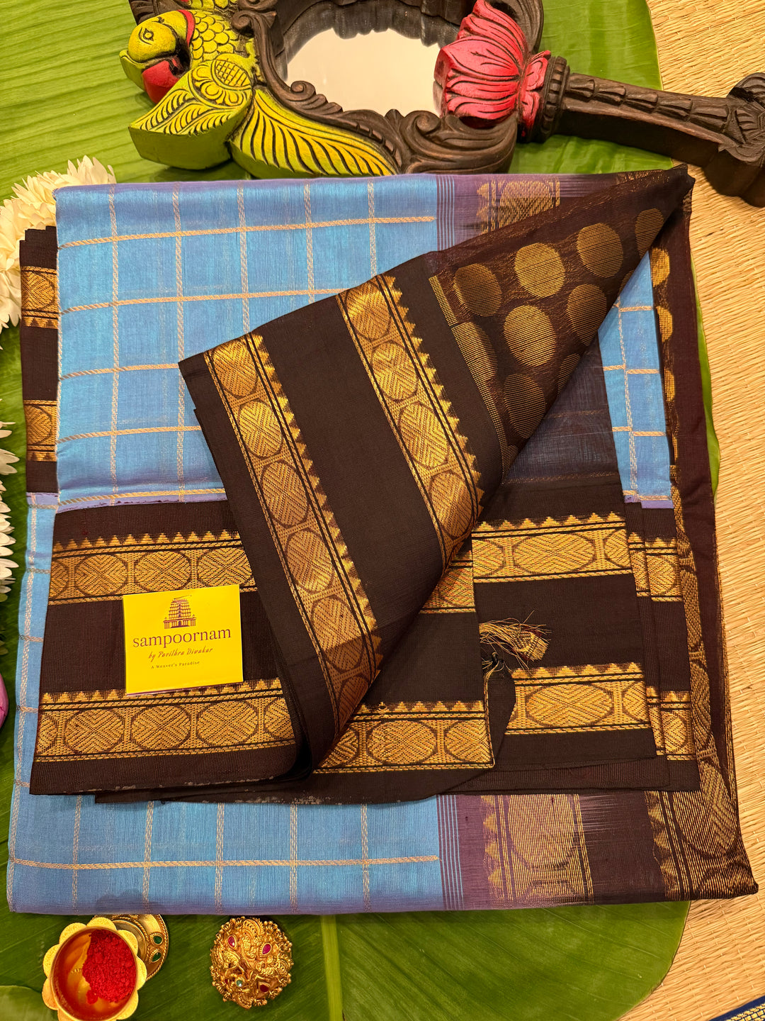 Steel Blue with Dark Brown  colour ,rich zari checks in the body ,traditional borders  and rich pallu Korvai Silk Cotton Saree