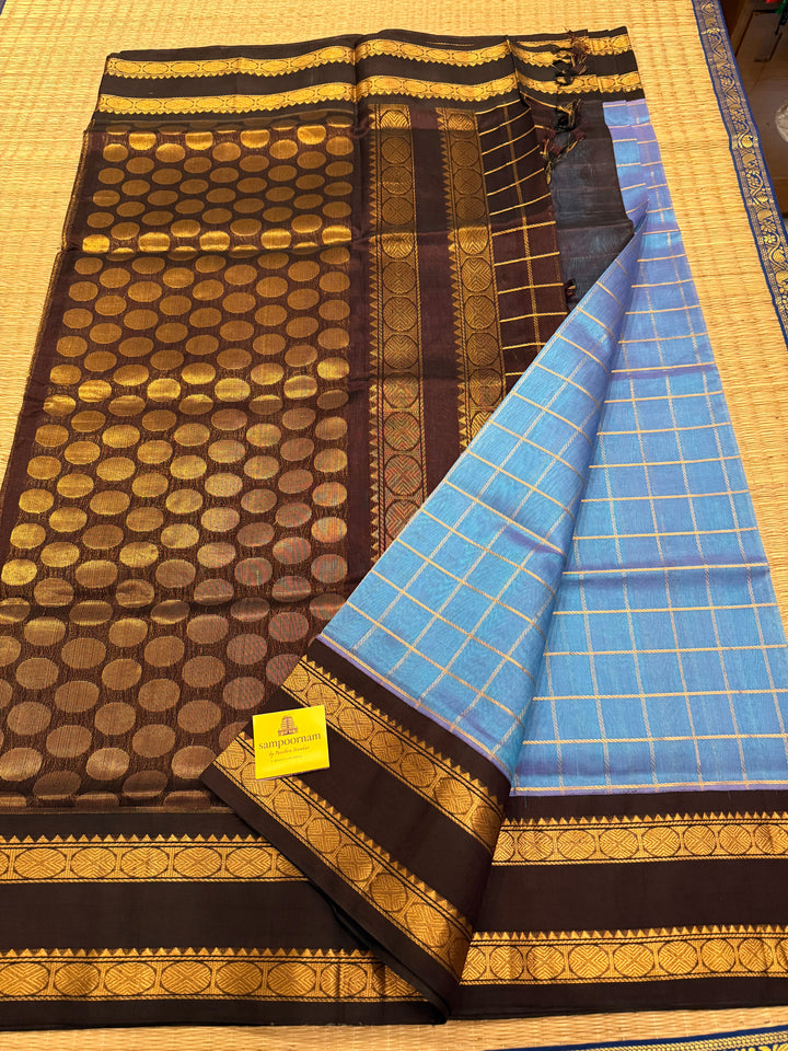Steel Blue with Dark Brown  colour ,rich zari checks in the body ,traditional borders  and rich pallu Korvai Silk Cotton Saree