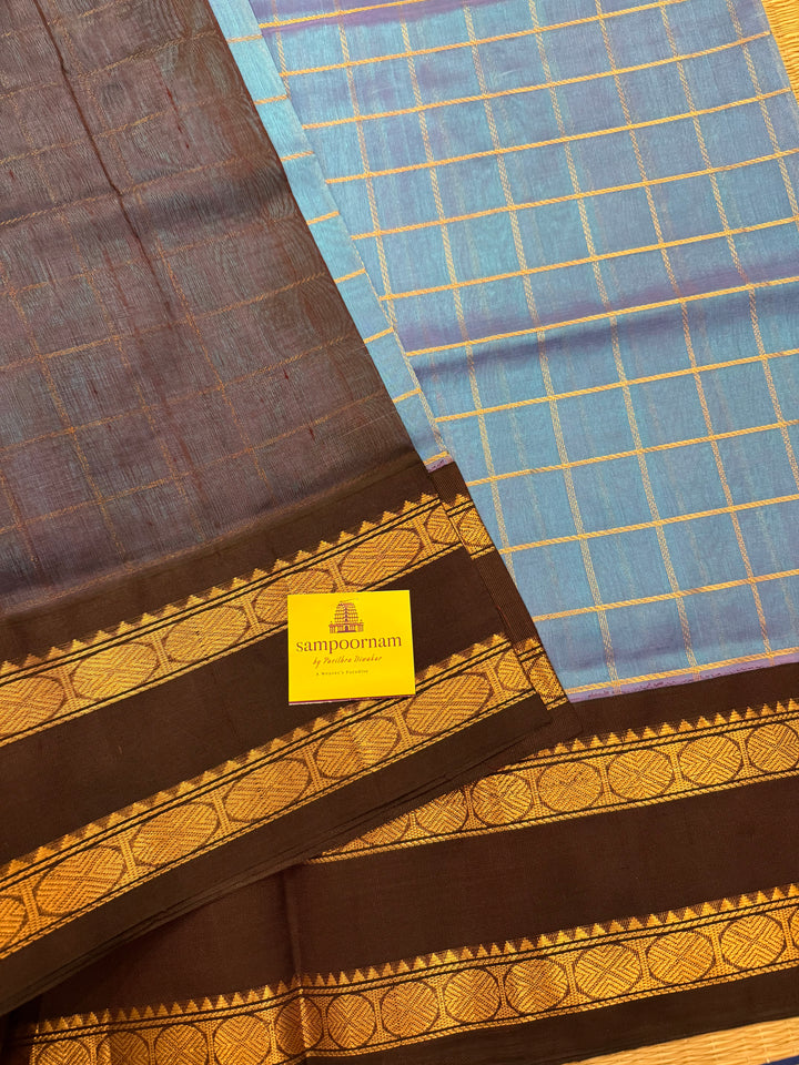 Steel Blue with Dark Brown  colour ,rich zari checks in the body ,traditional borders  and rich pallu Korvai Silk Cotton Saree