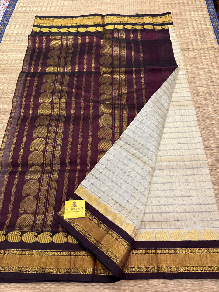 Offwhite with Brown ,full body checks ,traditional border rich pallu Korvai Silk Cotton Saree